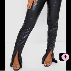 NWT Black faux leather pants with cut flare